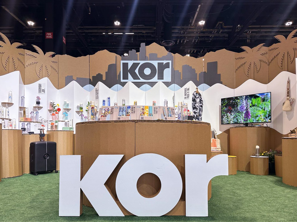 Cardboard sign for Kor Water's booth