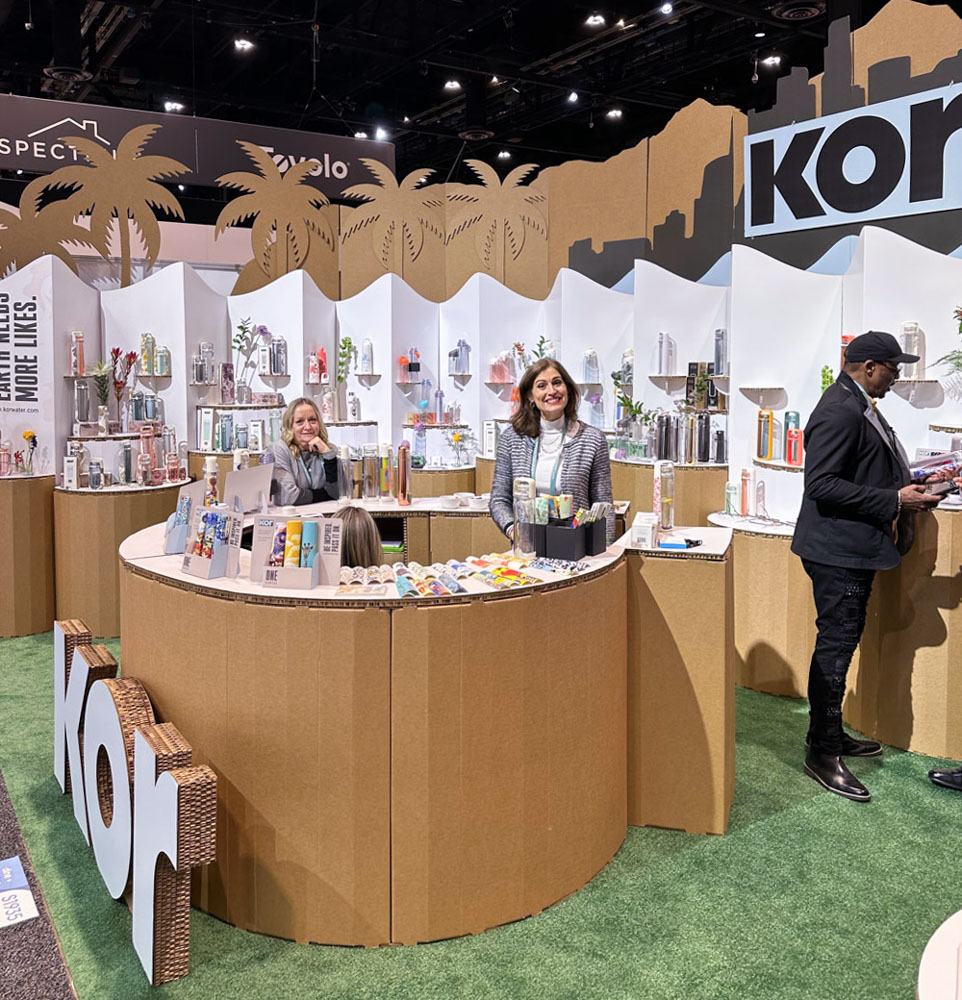 Cardboard design with message. Kor Water central counter