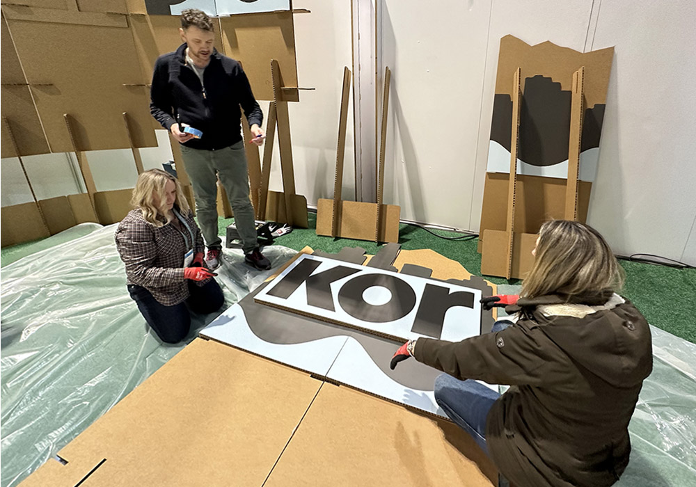 Cardboard design with message. Organizing the Kor Water set up.