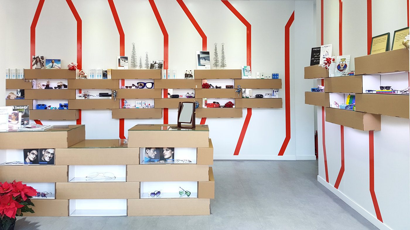 expositores para gafas carton optica almeria mostrador estantes baldas cartonlab diseño interior optica