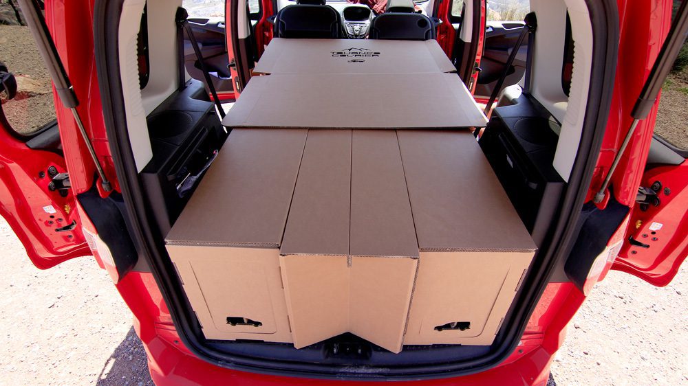 Cardboard pieces fitting in campervan.